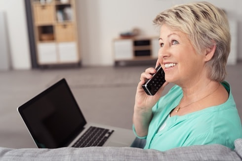 Woman talks on phone create successful estate plan in Spokane, WA