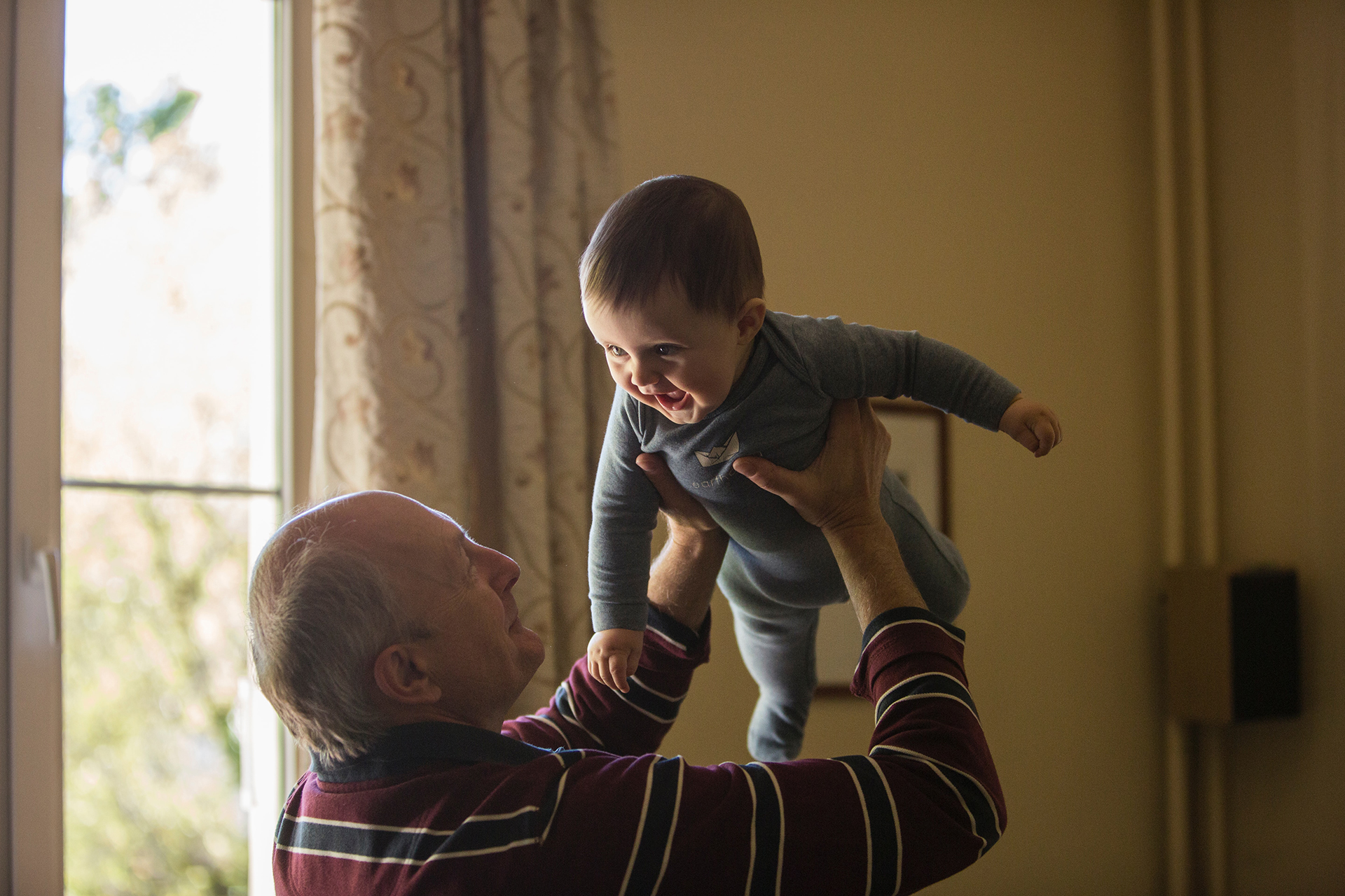 grandpa playing with grandchild